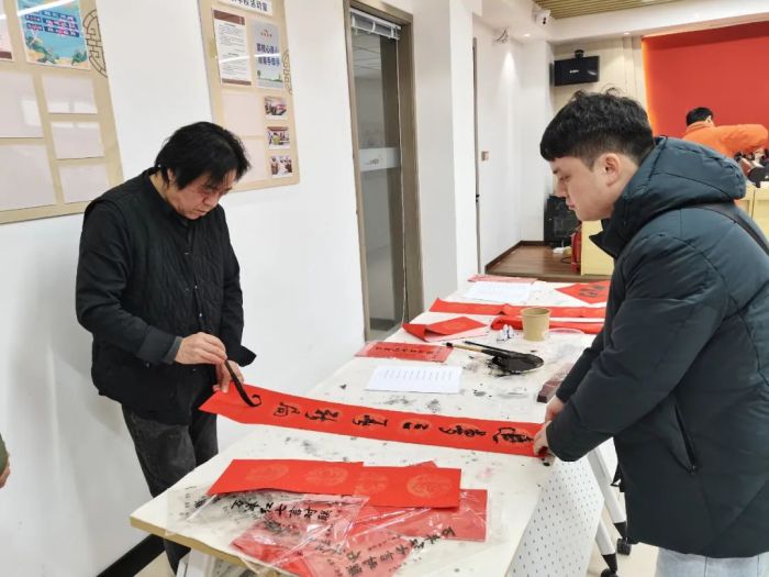 民革洛龙支部、修文坊社区邻里中心“书万福 送万家”义写春联主题活动(图7)